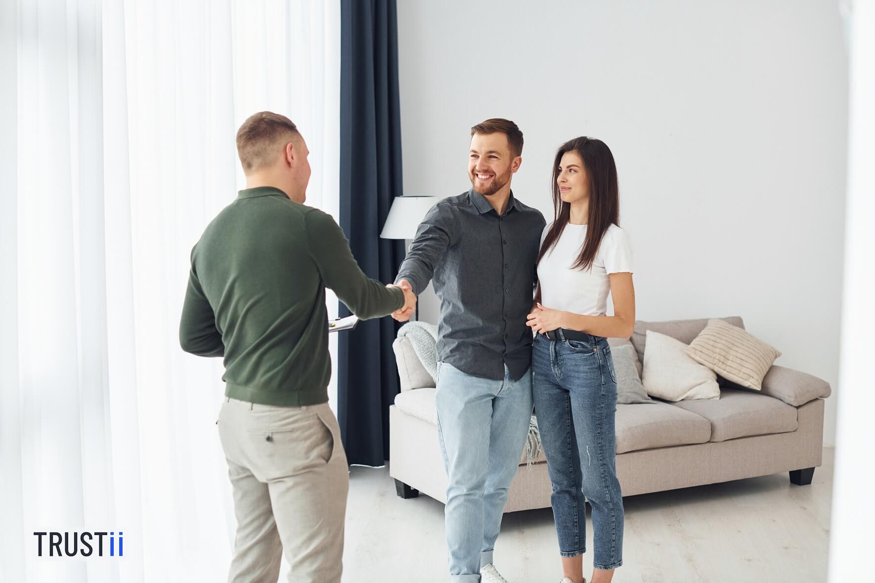 Salesman Helps Young Couple in choosing an Apartment