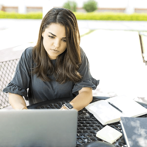 girl typing on computer